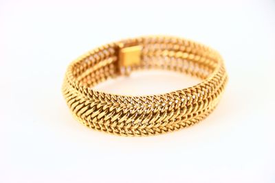 a gold mesh bracelet with a gold clasp