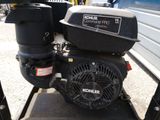 an image of a kohler engine on a stand