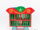 a toy cart with a star on top of it