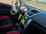 a car with a steering wheel and a dash board