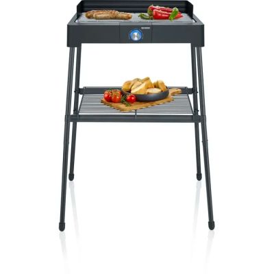 an image of a barbecue grill with vegetables and bread on it