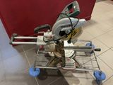 a picture of a mitring saw on a cart