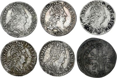 un ensemble de six pièces d'argent représentant des visages d'hommes et de femmes
