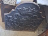 an old cast iron fire hydrant sitting on the floor