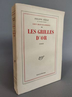 On voit ici la couverture du livre *Les grilles d'or*.