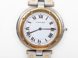 an image of a close up of a wrist watch with roman numerals