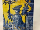 a book with a picture of a woman in a blue and yellow dress