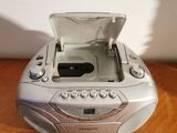 a radio that is sitting on a wooden table