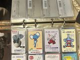 a suitcase with a bunch of cards inside of it
