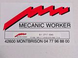 a sign that says mechanic worker on the side of a white wall
