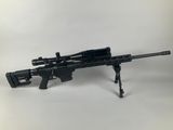 a toy gun with a scope on a white background