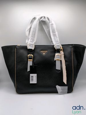 black leather tote bag with gold hardware and white ribbon