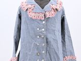 a picture of a blue and white checkered shirt with pink ruffles