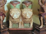 three figurines that are sitting on a table
