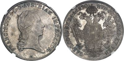 a close up of a silver coin with a picture of a man on it