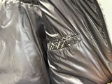 a close up of a jacket with a zipper on it
