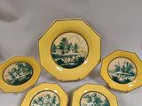 six yellow and green plates with a picture of a village on them