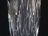 a glass vase that is sitting on a table