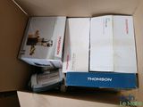 a box with a printer and a box with a printer on top of it