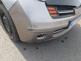 an image of a car that has been badly damaged