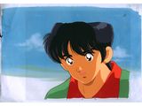 cartoon character of a boy with a red shirt and green jacket