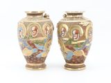 pair of asian vases on a white background with a white background