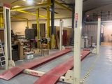 an image of a warehouse with a lot of equipment in it
