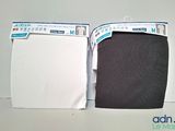 pair of white and black underwear sitting next to each other on a white surface