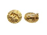 a close up of a pair of gold buttons on a white background