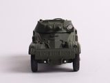 a toy army vehicle that is sitting on a white surface