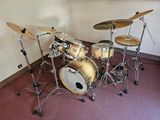 a drum set that is sitting in a room