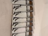 six pairs of scissors in a package on a table