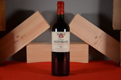 a bottle of wine that is sitting on a table