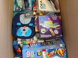 a box full of children ' s books and toys
