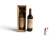 a bottle of wine in a wooden box next to a bottle of wine