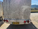 a truck that is parked on the side of the road