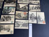 some old black and white photos of people and vehicles on a table