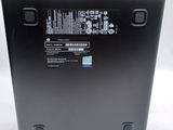 the back of a laptop with the battery removed and the back panel missing