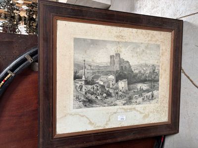 une photo d'un tableau accroché au mur d'une pièce
