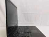 an open laptop computer sitting on top of a white table