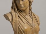 marble bust of a woman with a veil on her head