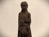a statue of a woman holding a baby in her arms