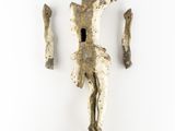 an image of a sculpture of a man holding a piece of wood
