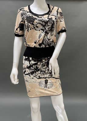 an image of a mannequin wearing a dress with a black and white design