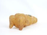 a small figurine of an elephant on a white surface