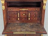an old wooden cabinet with marble top and drawers