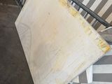 a pile of furniture that has been left on the floor
