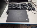a laptop, keyboard, mouse and mouse on a desk