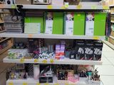 a lot of items on the shelves in the store