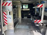 a view of the inside of an ambulance with its doors open